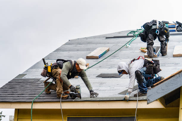 Professional Roofing technician working in McChord AFB, WA
